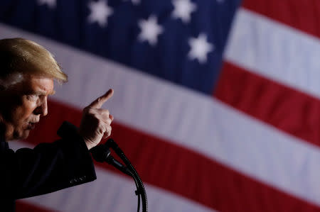 U.S. President Donald Trump addresses a campaign rally at the Columbia Regional Airport in Columbia, Missouri, U.S., November 1, 2018. REUTERS/Carlos Barria