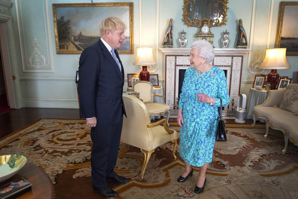 Queen Elizabeth II welcomes newly elected leader of the Conservative party Boris Johnson during an audience in Buckingham Palace, London, where she invited him to become Prime Minister and form a new government.