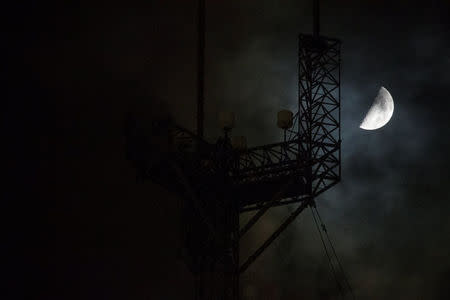 A darkened TV tower that was the scene of an accident that killed three workers according to local media, is pictured in Miami Gardens, Florida, U.S., September 27, 2017. REUTERS/Carlo Allegri