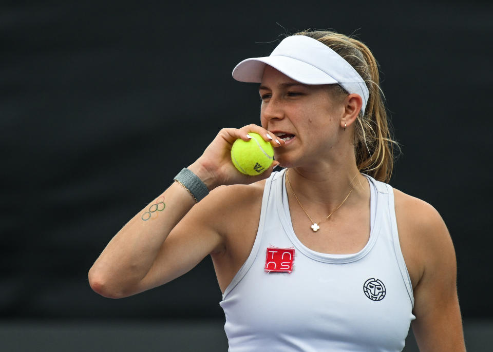 Ellen Perez reacts during a match.