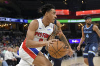 Detroit Pistons guard Jared Rhoden drives against the Memphis Grizzlies during the first half of an NBA basketball game Friday, April 5, 2024, in Memphis, Tenn. (AP Photo/Brandon Dill)