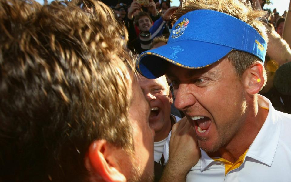  Graeme McDowell of Europe celebrates his 3&1 win to secure victory for the European team on the 17th green with Ian Poulter (R) in the singles matches during the 2010 Ryder Cup at the Celtic Manor Resort on October 4, 2010 in Newport, Wales - Getty Images