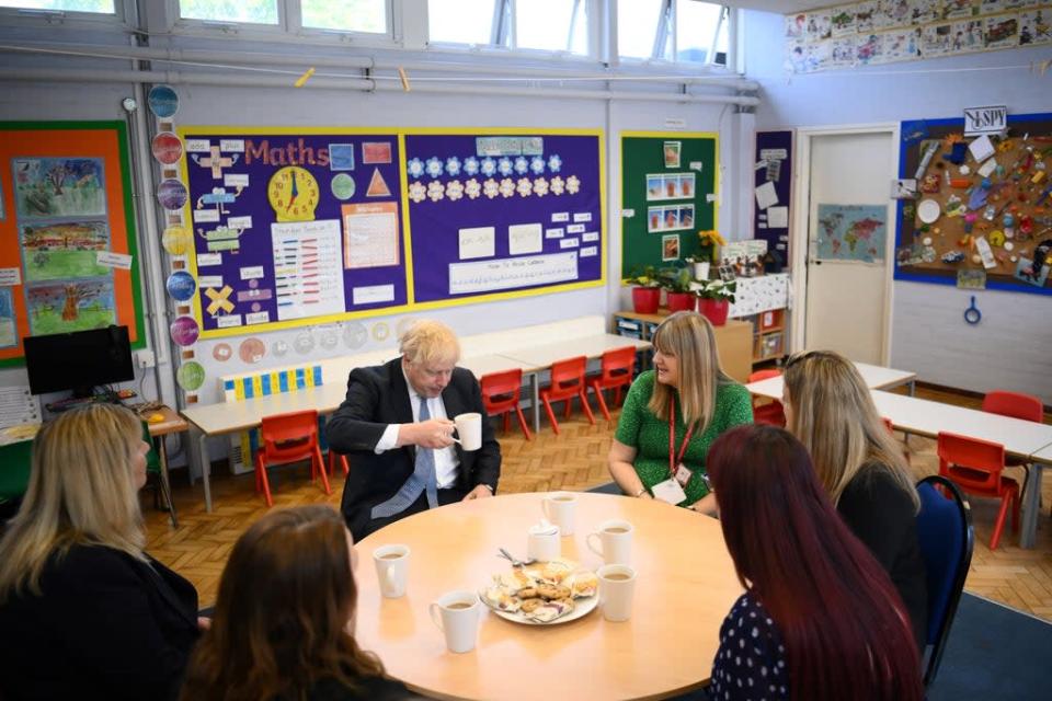 Prime Minister Boris Johnson has a cup of tea with teachers at Field End Infant School (Daniel Leal/PA) (PA Wire)