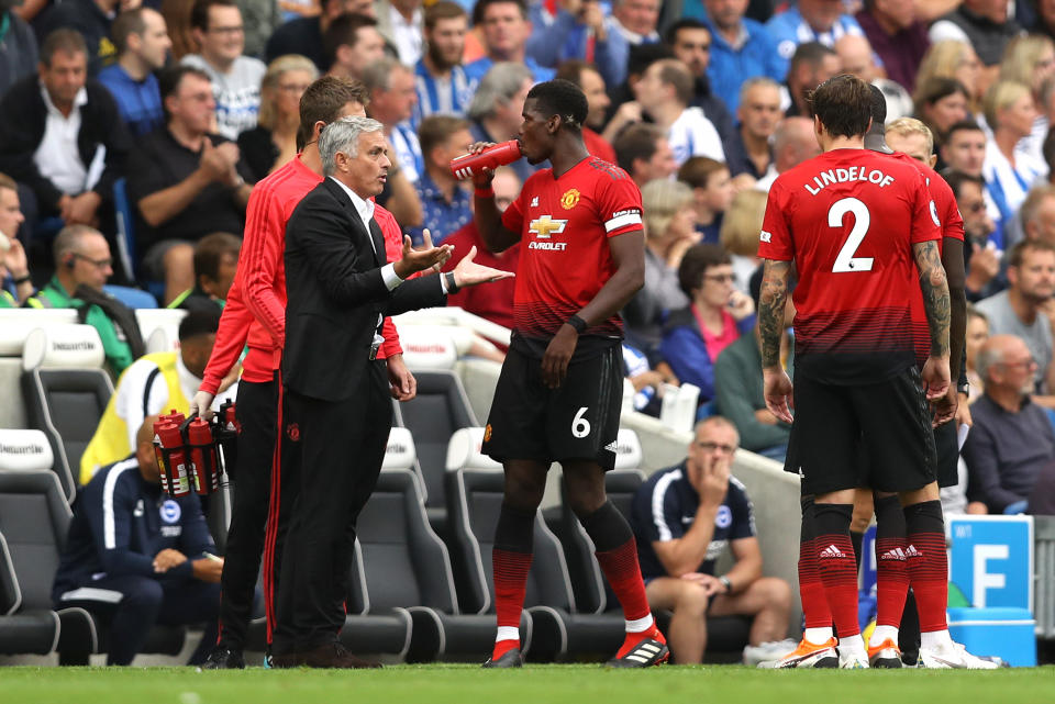 Jose Mourinho is animated during discussions with his players