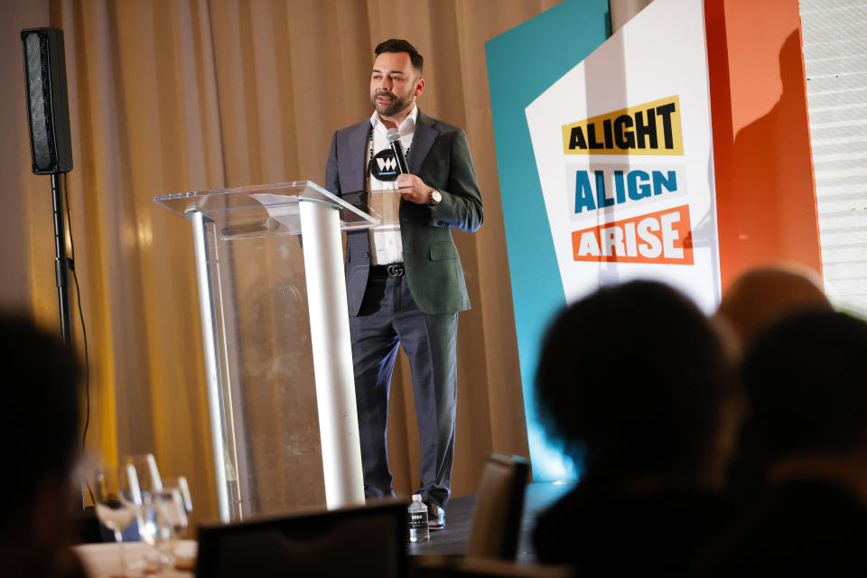 Founder and CEO of the Decolonizing Wealth Project, Edgar Villanueva, speaks during the Alight Align Arise conference on Wednesday, June 7, 2023, in Atlanta. Villanueva announced on Friday that the Decolonizing Wealth Project is committing $20 million over five years to boost campaigns run by nonprofits across the country for reparations along with a research collaboration with Boston University to map reparation projects. (AP Photo/Alex Slitz)