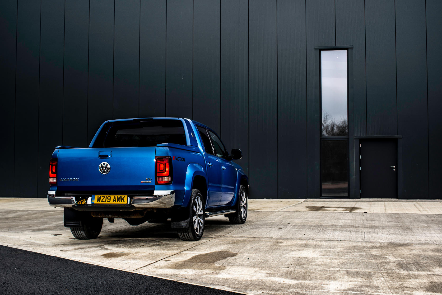 Smoked rear lights feature at the back of the truck