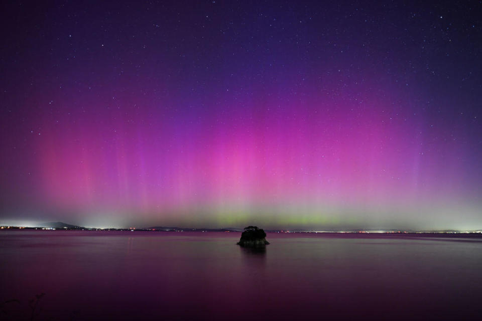 Northern lights illuminate the sky of San Francisco North Bay as seen from China Camp Beach in San Rafael, California, on May 11, 2024. / Credit: Tayfun Coskun/Anadolu via Getty Images