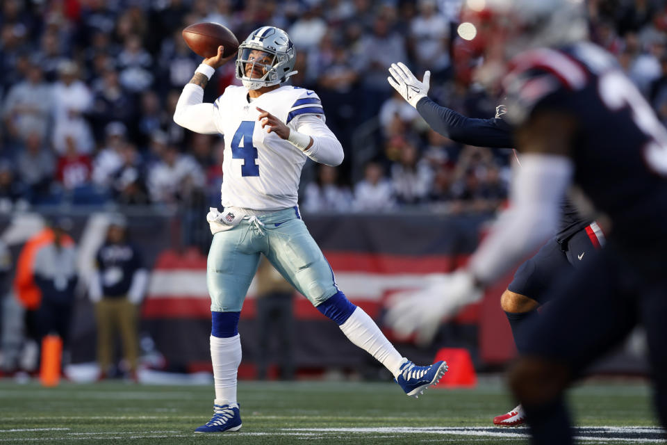 Dallas Cowboys quarterback Dak Prescott (4) throws a pass during the first half of an NFL football game against the New England Patriots, Sunday, Oct. 17, 2021, in Foxborough, Mass. (AP Photo/Michael Dwyer)