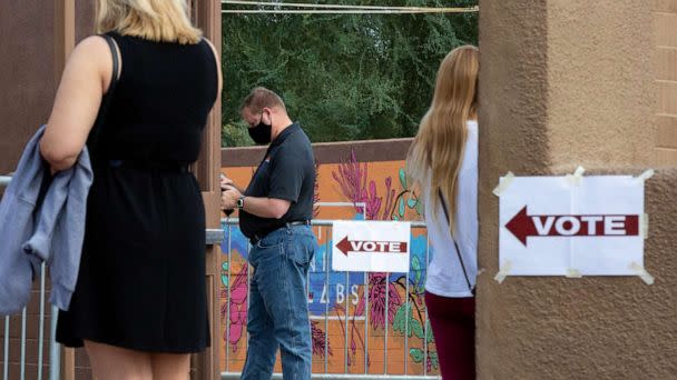 PHOTO: Voters wait to cast their ballots at Marquee Theatre on Nov. 3, 2020, in Tempe, Ariz. (Courtney Pedroza/Getty Images, FILE)