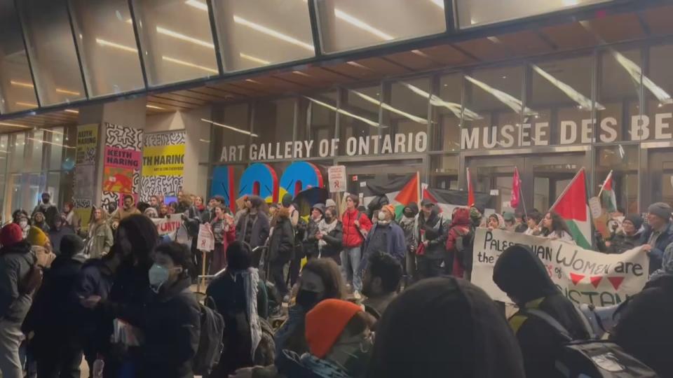 Pro-Palestinian protesters block the entrances to the Art Gallery of Ontario in Toronto on Saturday. (Christian Paas-Lang/CBC - image credit)