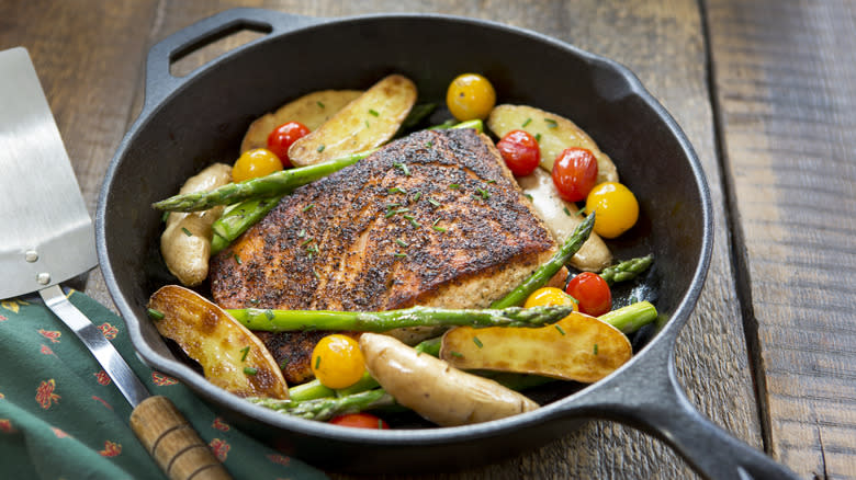 fingerling potatoes and salmon in skillet