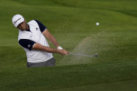 Jon Rahm, of Spain, hits from the bunker on the 10th hole during the second round of the PGA Championship golf tournament at TPC Harding Park Friday, Aug. 7, 2020, in San Francisco. (AP Photo/Jeff Chiu)