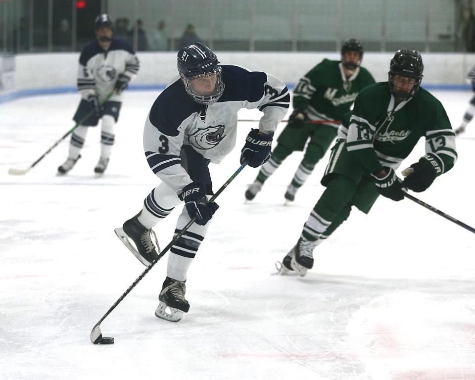 Plymouth North's Sean Hallissey looks to shoot a wrist shot during third period action of their game against Marshfield at Armstrong Arena in Plymouth on Wednesday, Dec. 14, 2022.