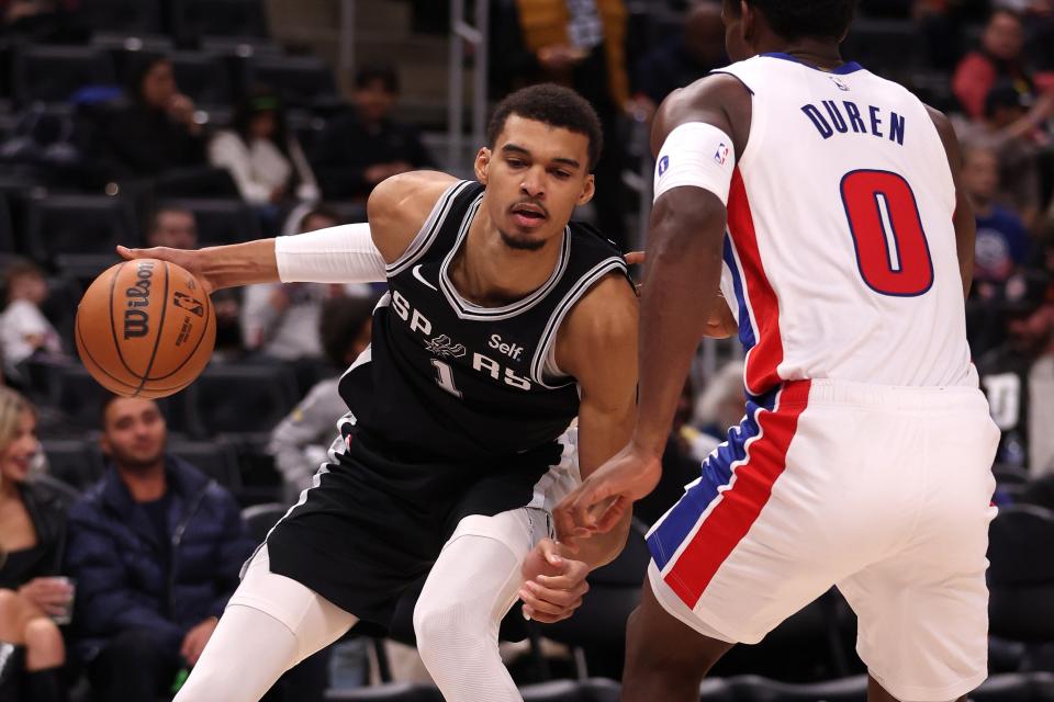 Spurs center Victor Wembanyama tries to drive around Pistons center Jalen Duren during the second half of the Pistons' 130-108 loss on Wednesday, Jan. 10, 2024, at Little Caesars Arena.