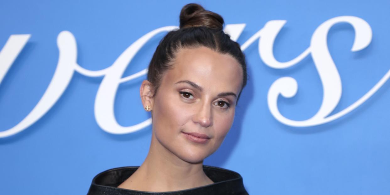 alicia vikander scandi top knot