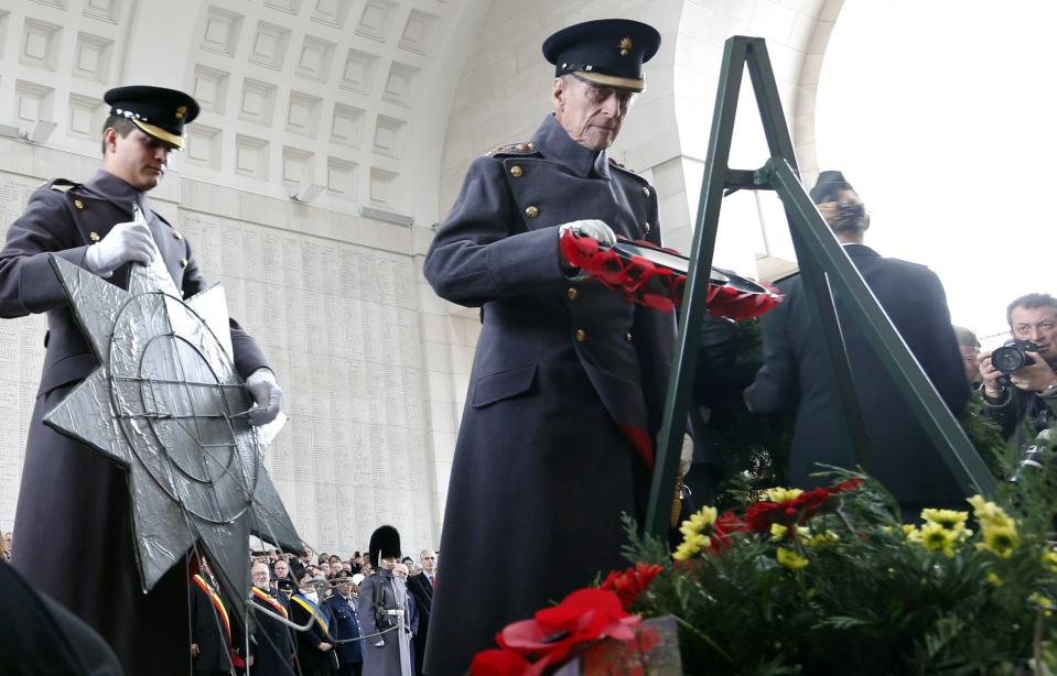 Britain's Prince Philip lays a wreath during a Last Post ceremony at the Menin Gate Memorial in Ypres