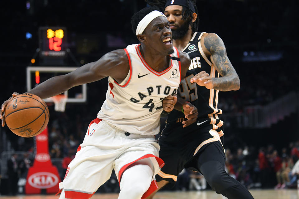 Toronto Raptors forward Pascal Siakam (43) drives as Atlanta Hawks guard DeAndre' Bembry defends during the second half of an NBA basketball game Monday, Jan. 20, 2020, in Atlanta. Toronto won 122-117. (AP Photo/John Amis)