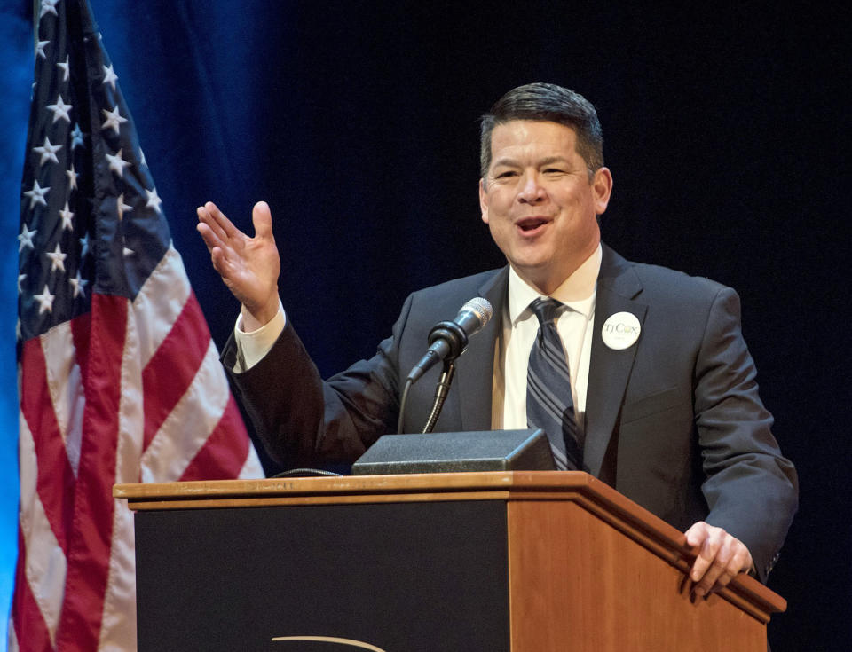 In this Jan. 5, 2018 photo, T.J. Cox, a candidate for the 21st U.S. Congressional District, speaks at a Democratic Party debate at the Gallo Center for the Arts in Modesto. Cox has edged ahead of Republican David Valadao in a U.S. House race in California's farm belt, where votes continue to be counted. Cox has trailed since election night but pulled ahead by 438 votes Monday, Nov. 26, 2018, according to tallies in the 21st District that cuts through four Central Valley counties. The Associated Press had declared Valadao the winner, but votes that have been counted since Nov. 6 narrowed the race and the AP retracted its race call on Monday. (Andy Alfaro/Modesto Bee via AP)