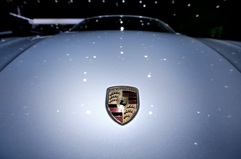 A Porsche logo is pictured on the front of a car during the second media day of the 86th International Motor Show in Geneva, Switzerland, March 2, 2016. REUTERS/Denis Balibouse