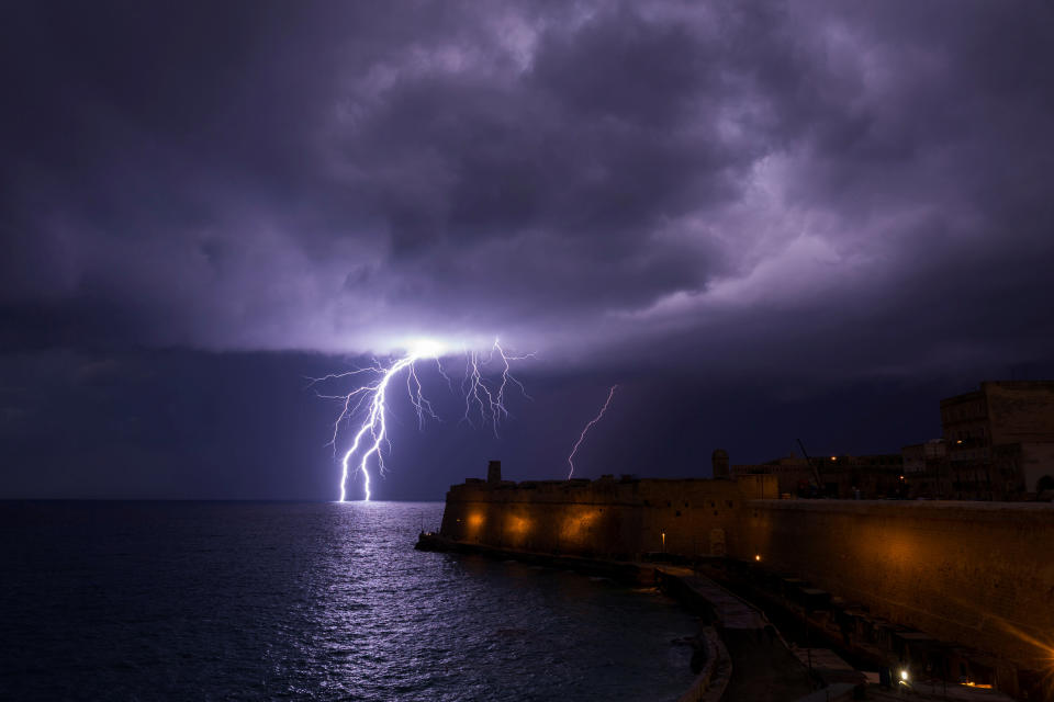 A lightning bolt strikes the sea near Fort St Elmo during a storm in Valletta, Malta February 27, 2019.&nbsp;