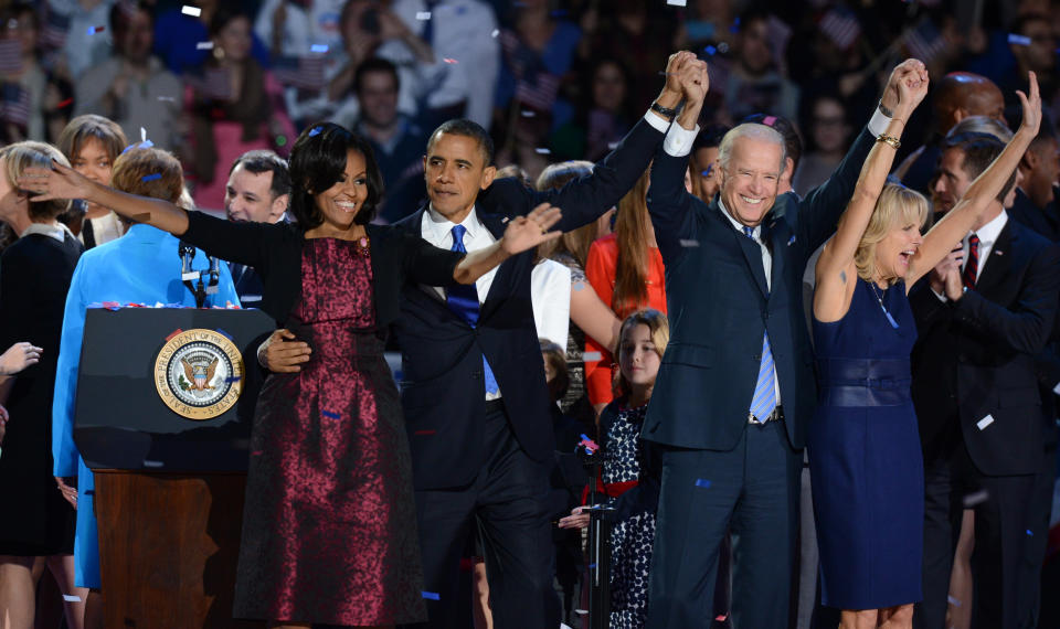 (L-R) US First Lady Michelle Obama, US President Barack Obama, US Vice President Joe Biden and his wife Jill Biden celebrate on election night November 7, 2012 in Chicago, Illinois. Obama and Biden won re-election to a second 4-year term.    AFP PHOTO / Saul LOEB        (Photo credit should read SAUL LOEB/AFP/Getty Images)