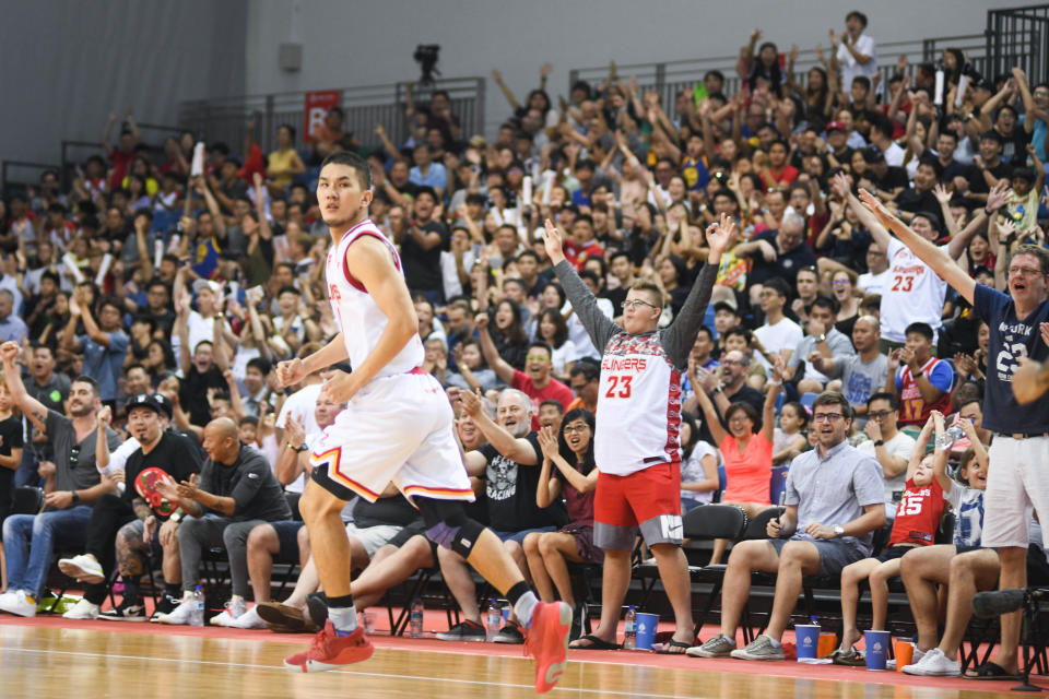 The Singapore Slingers' Ng Han Bin earning cheers from the crowd after scoring against the CSL Knights Indonesia during Game Two of the Asean Basketball League Finals. (PHOTO: Stefanus Ian/Yahoo News Singapore)