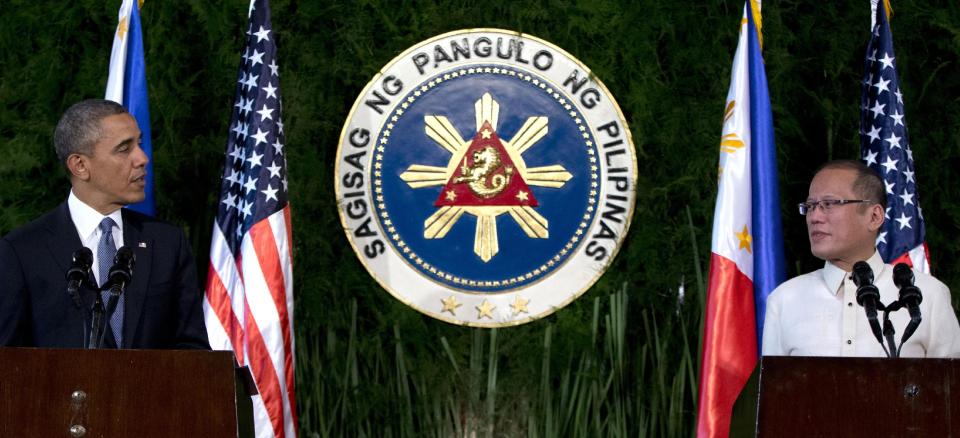 FILE - In this Monday, April 28, 2014 file photo, U.S. President Barack Obama, left, speaks next to Philippine President Benigno Aquino III during a joint news conference at Malacanang Palace in Manila, Philippines, after signing a new defense pact with the Philippines aimed at reassuring Asian allies of American backing as they wrangle with Beijing's growing economic and military might. Vietnam demanded China stop oil drilling operations in a disputed patch of the South China Sea, saying on Monday, May 5 that Beijing's decision to deploy a deep sea rig over the weekend was illegal. (AP Photo/Carolyn Kaster, File)