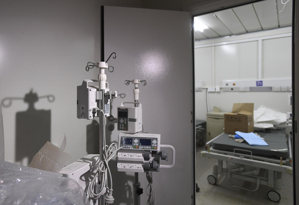 Medical equipment is seen at the Huoshenshan temporary field hospital in Wuhan in central China's Hubei Province, Sunday, Feb. 2, 2020. The Philippines on Sunday reported the first death from a new virus outside of China, where authorities delayed the opening of schools in the worst-hit province and tightened quarantine measures in a city that allow only one family member to venture out to buy supplies. (Chinatopix via AP)