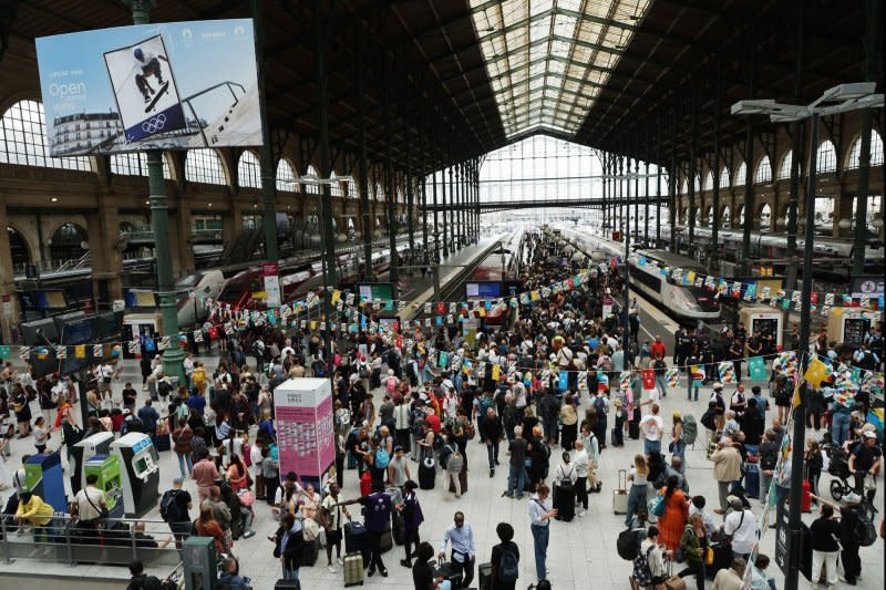 Large crowds form at the main Gare Du Nord train station after an arson attack has caused mayhem and delays to the train network and Eurostar in Paris on Friday. Transportation officials said service is back to normal. Photo by Hugo Philpott/UPI
