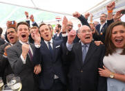 <p>From left, Julius and Johannes Laschet, sons of top candidate of the Christian Democratic Union Armin Laschet, his father Heinz Laschet and daughter Eva Laschet, react to the first exit polls after the regional state elections of North Rhine-Westphalia, in Duesseldorf, Germany, May 14, 2017. (Photo: Kai Pfaffenbach/Reuters) </p>