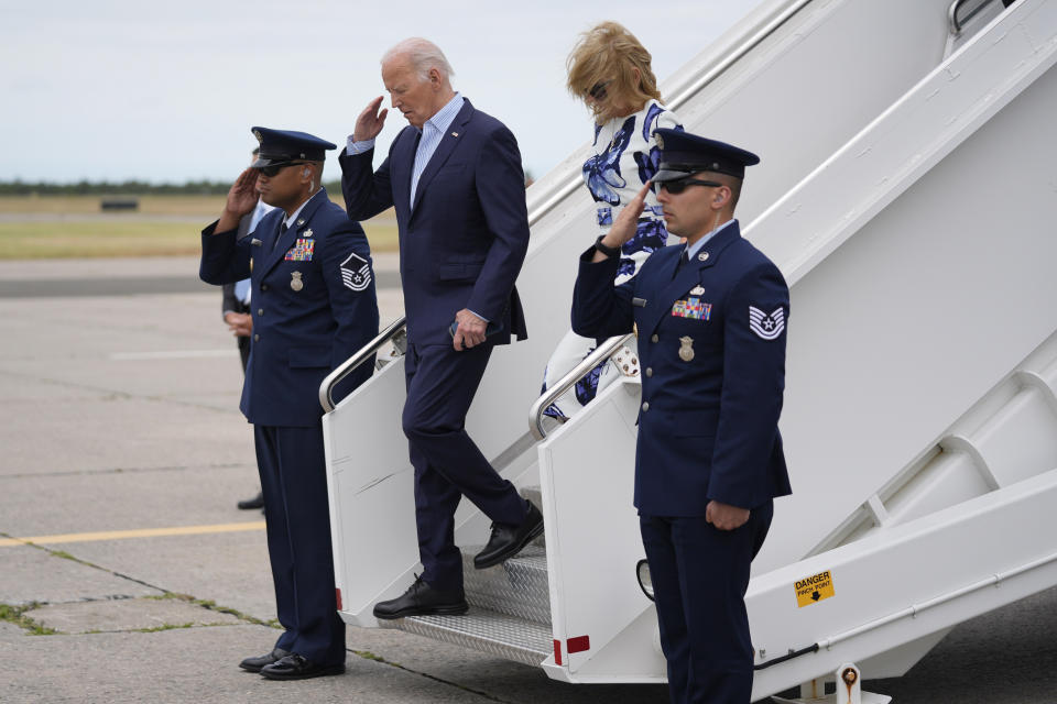 President Joe Biden, left, and first lady Jill Biden arrive at Francis S. Gabreski Airport, Saturday, June 29, 2024, in Westhampton Beach, N.Y. (AP Photo/Evan Vucci)