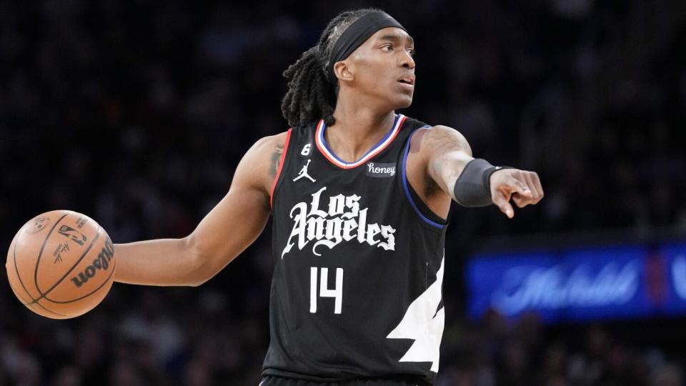 Clippers guard Terance Mann controls the ball against the New York Knicks on Feb. 4.