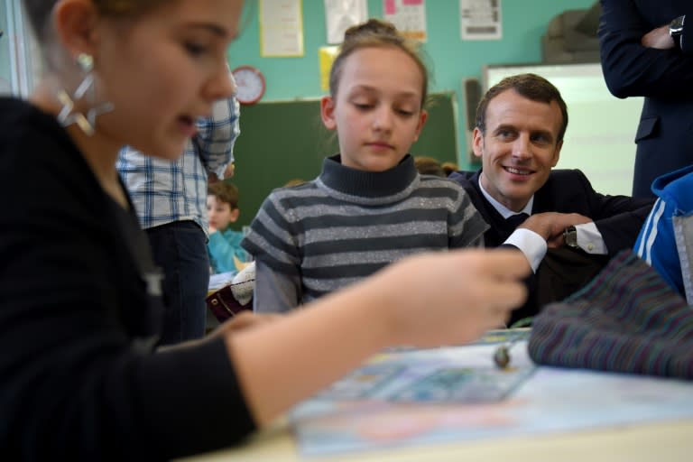 French President Emmanuel Macron during a visit to a primary school in Rilly-sur-Vienne, central France earlier this month. Macron wants to focus a efforts on improving early-age literacy