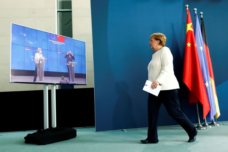 FILE PHOTO: German Chancellor Merkel holds a video news conference with EU Council President Michel and EU Commission President von der Leyen, in Berlin