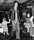 <p>Paul McCartney and his daughters, 5-year-old Stella, and 7-year-old Mary, hurry to board their plane at Heathrow Airport in 1976. </p>