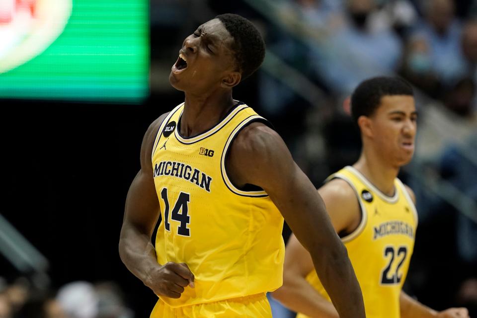 Michigan forward Moussa Diabate (14) reacts during the first half against North Carolina in Chapel Hill, N.C., Wednesday, Dec. 1, 2021