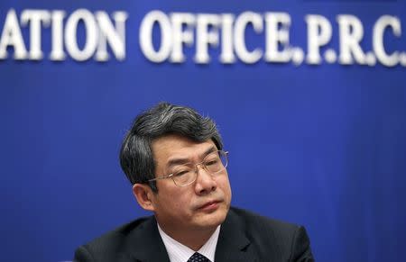 Liu Tienan, then head of the National Energy Administration and deputy chairman of China's National Development and Reform Commission (NDRC), attends a news conference about Spring Festival transport in Beijing in this January 8, 2012 file photo. REUTERS/Stringer/Files