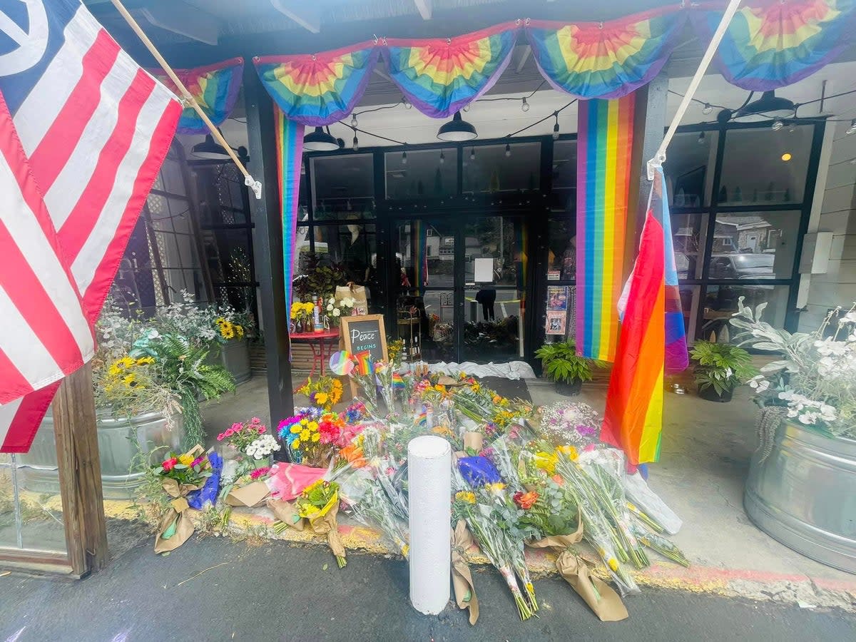 Mourners left flowers outside Laura Carleton’s Mag.Pi store in Lake Arrowhead, California, after she was shot dead on Friday (Mountain Provisions Cooperative)