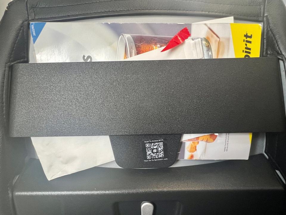 There was no seat-back pocket, only a small cubby at the top of the seat in front of me that could fit a book, but not a water bottle.