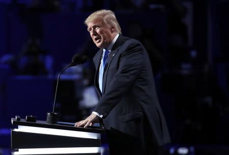 Republican U.S. Presidential Candidate Donald Trump takes to the stage to introduce his wife Melania at the Republican National Convention in Cleveland, Ohio, U.S. July 18, 2016. REUTERS/Jim Young