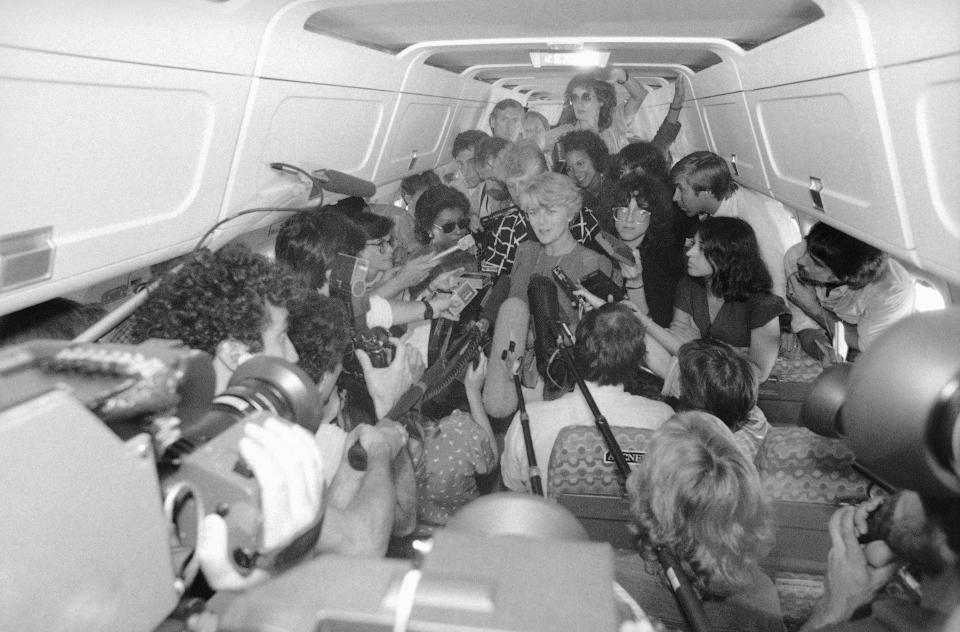 Vice presidential candidate Geraldine Ferraro is surrounded by reporters and photographers during the first on the record interview on a plane from Amagansett, New York to La Guardia Airport in Queens, Saturday, August 25, 1983 in New York.
