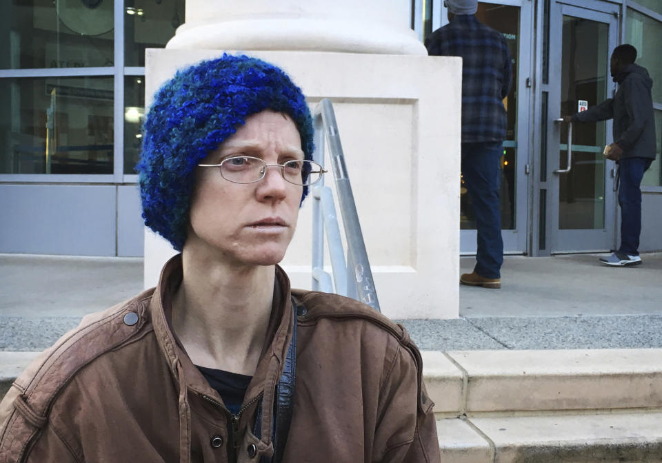 FILE - In this Dec. 14, 2017, file photo, Adele MacLean talks to reporters outside Atlanta's municipal court. State and local police on Wednesday, May 31, 2023 arrested MacLean and two other people who run a fund that bails out protesters against an Atlanta police training complex, accusing them of money laundering and charity fraud. (AP Photo/Kate Brumback, File)