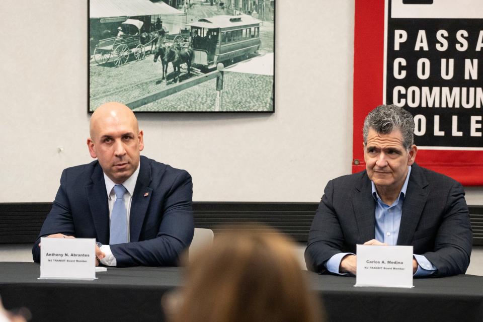 Mar 5, 2024; Paterson, NJ, USA; NJ Transit Board Members (left) Anthony Abrantes and Carlos Medina during a public hearing about NJ Transit's proposed fare hike at Passaic County Community College.