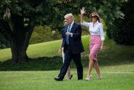 <p>The president and first lady head to Air Force One for a trip to Trump National Golf Club in Bedminster, NJ for the 4th of July weekend. Melania looked festive with a classic white collared shirt, a red and white checkered skirt, and (if you notice) pale blue stilettos. </p>