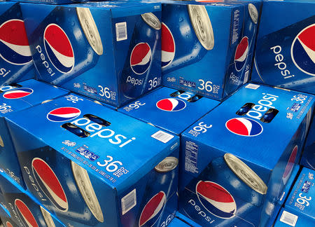 Cases of Pepsi are shown for sale at a store in Carlsbad, California, U.S., April 22, 2017. REUTERS/Mike Blake/Files