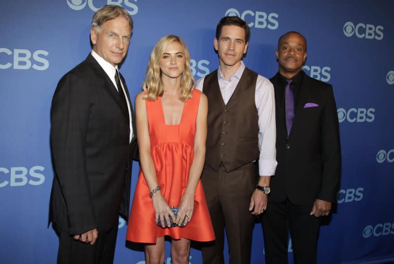 Left to right, Mark Harmon, Emily Wickersham, Brian Dietzen and Rocky Carroll arrive on the red carpet at the CBS 2014 Upfront Presentation at The Tents at Lincoln Center in New York City in 2014. File Photo by John Angelillo/UPI