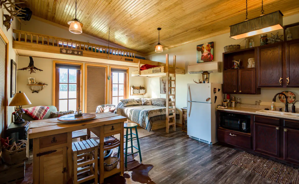 Want to get away from the city for a while? Enjoy some time on this quaint goat farm Airbnb in Keatchi Louisiana. This stay will give you the full country living experience.