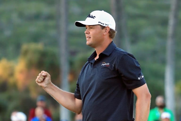 Patton Kizzire reacts after making a par putt on the sixth playoff hole to defeat James Hahn and win the Sony Open