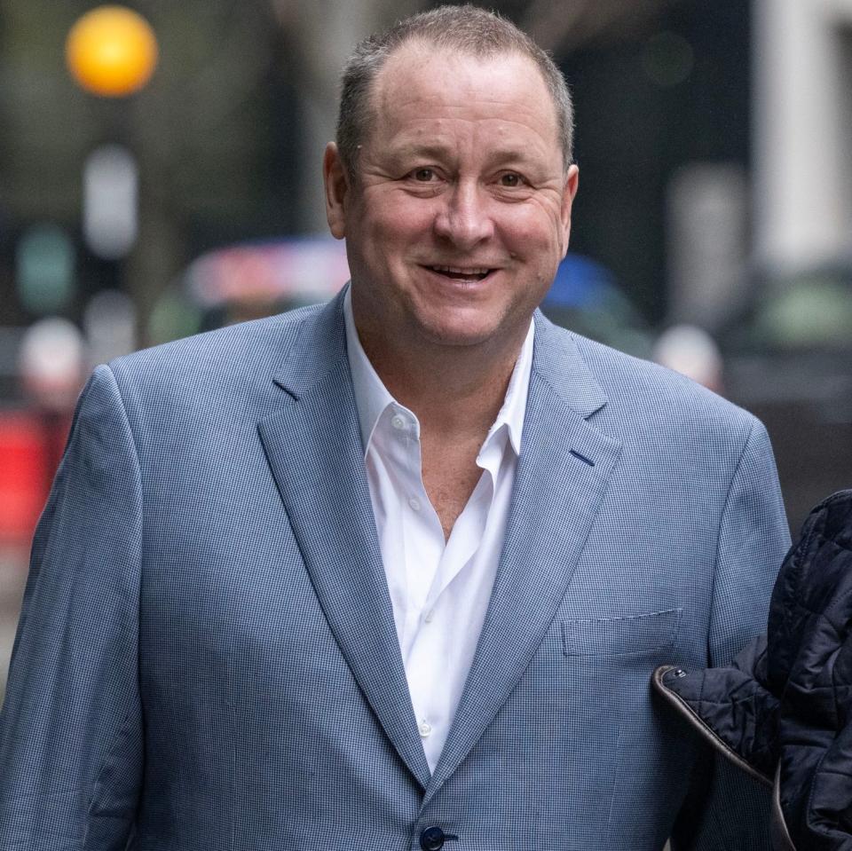 Mike Ashley arrives at the High Court