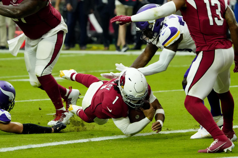 Arizona Cardinals quarterback Kyler Murray (1) dives in for a touchdown against the Minnesota Vikings during the first half of an NFL football game, Sunday, Sept. 19, 2021, in Glendale, Ariz. (AP Photo/Rick Scuteri)